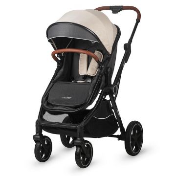 Carucior transformabil 3in1 Coccolle Amani Sand Beige iSize, Cadru aluminiu, Roti mari din cauciuc plin, Suspensie, Husa de picioruse, Husa Ploaie, Plasa insecte, Copertina XXL, Fante de ventilatie, Piesa reversibila